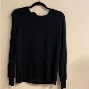 Black sweater with bow